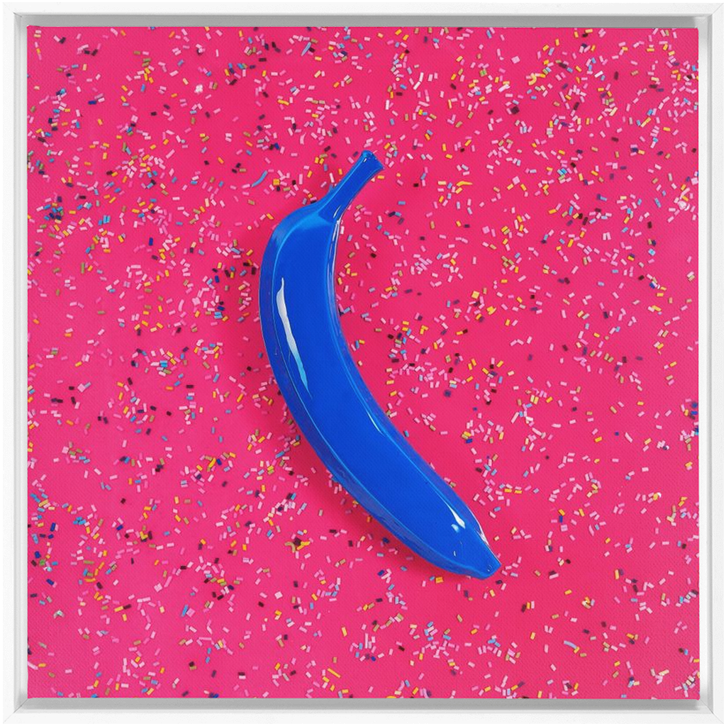 Canvas Print: "Blue banana on pink with sprinkles"