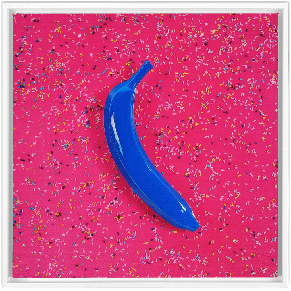Canvas Print: "Blue banana on pink with sprinkles"